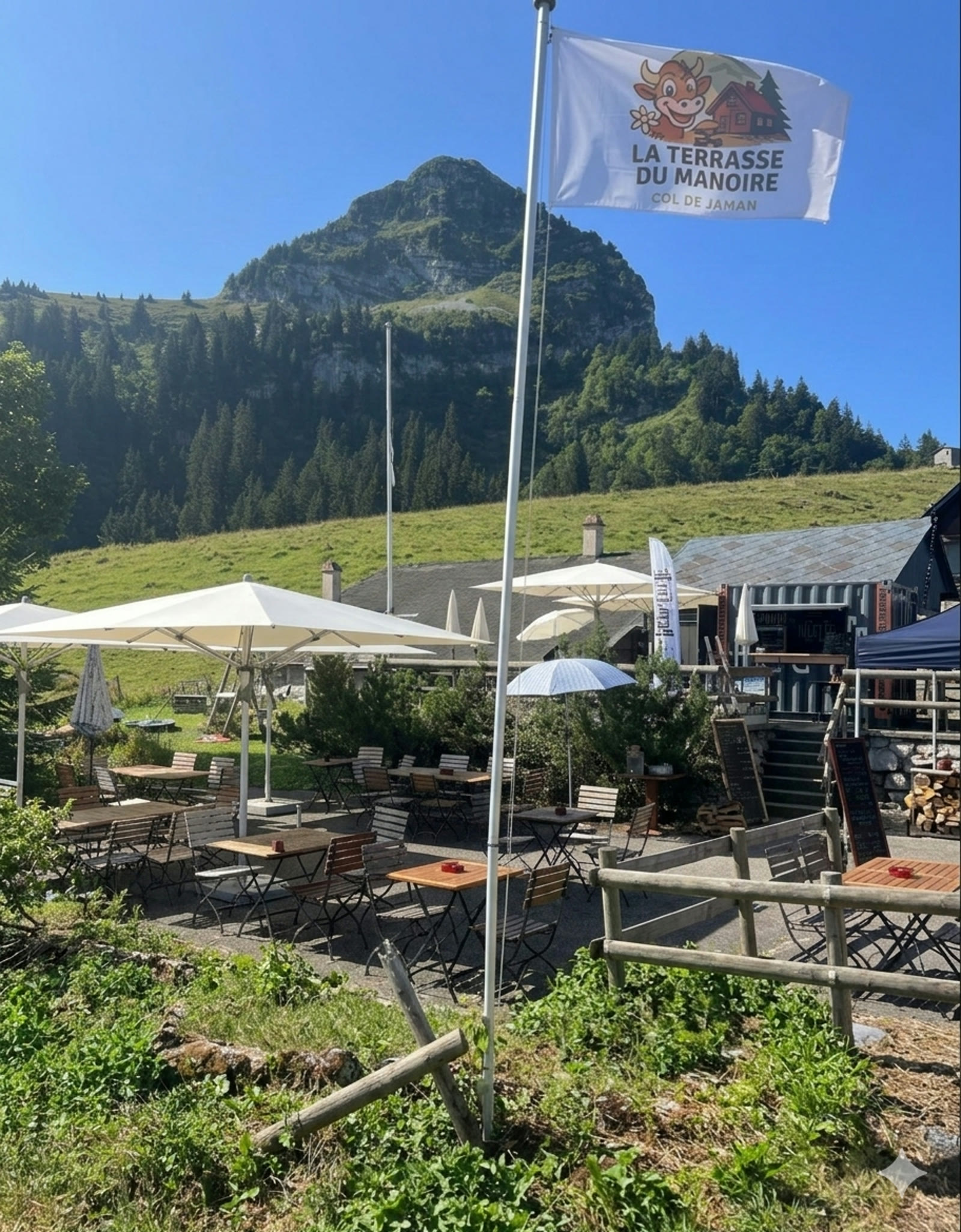La terrasse du Manoïre avec le drapeau, Dent de Jaman en arrière-plan